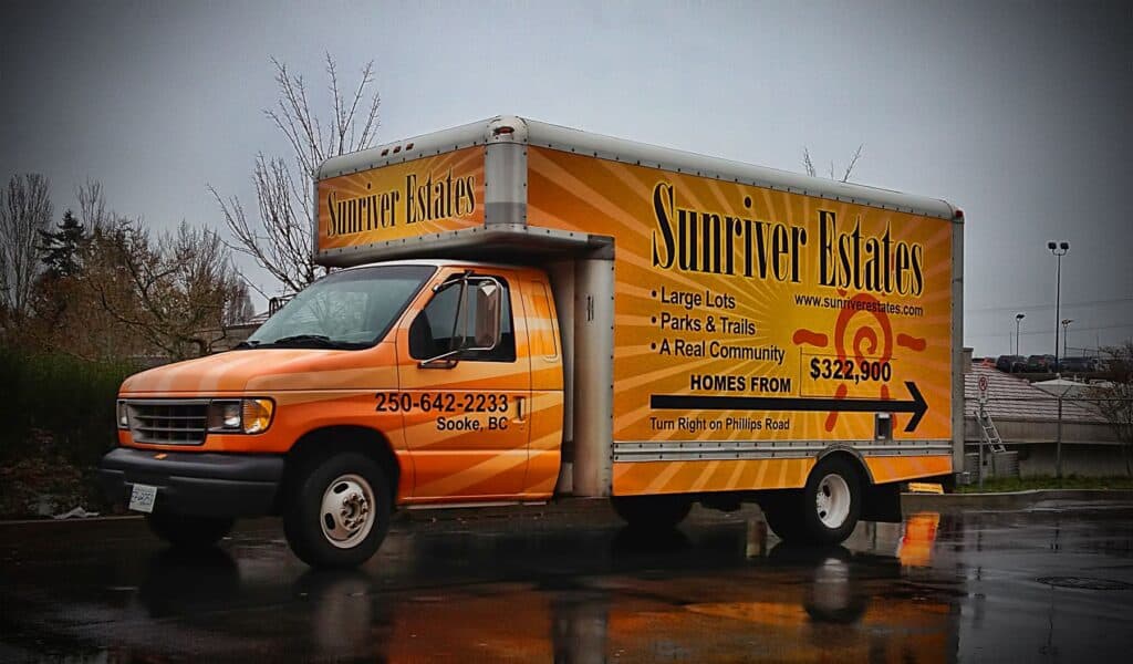 Custom vehicle wrap promoting Sunriver Estates residential community.