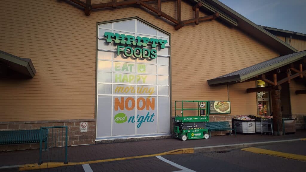 Sign for The Sign Pad featuring colorful text and logo.