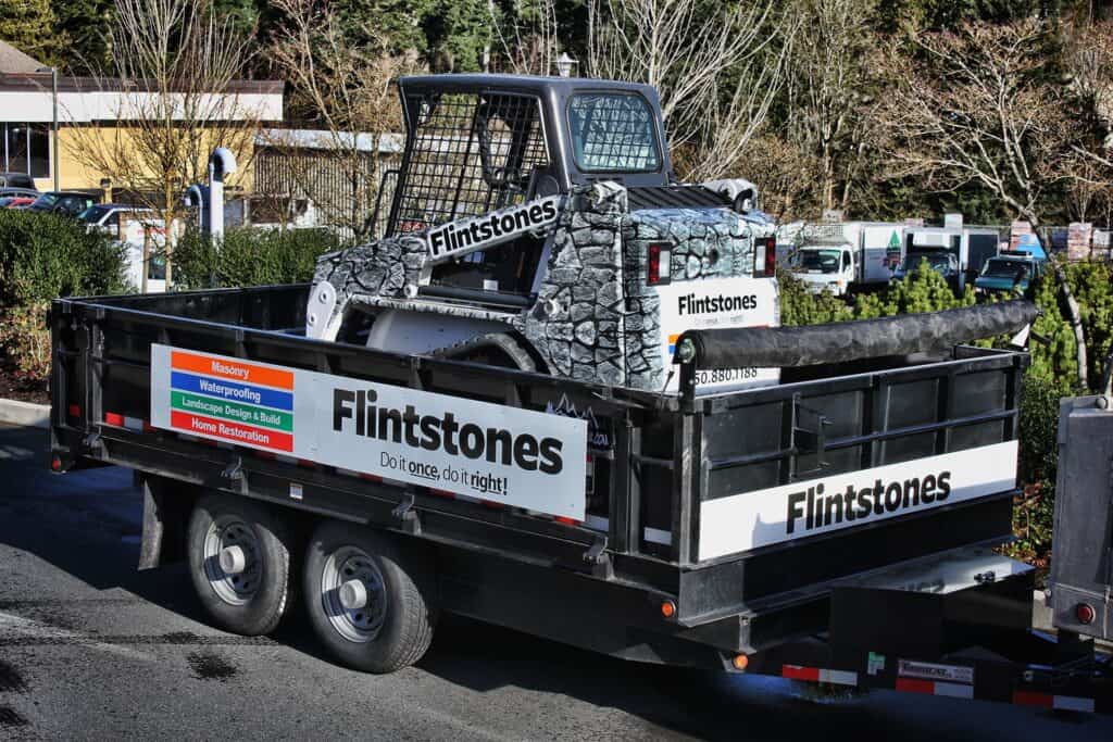 Custom vehicle wrap for Flintstones-themed sign pad in Victoria.