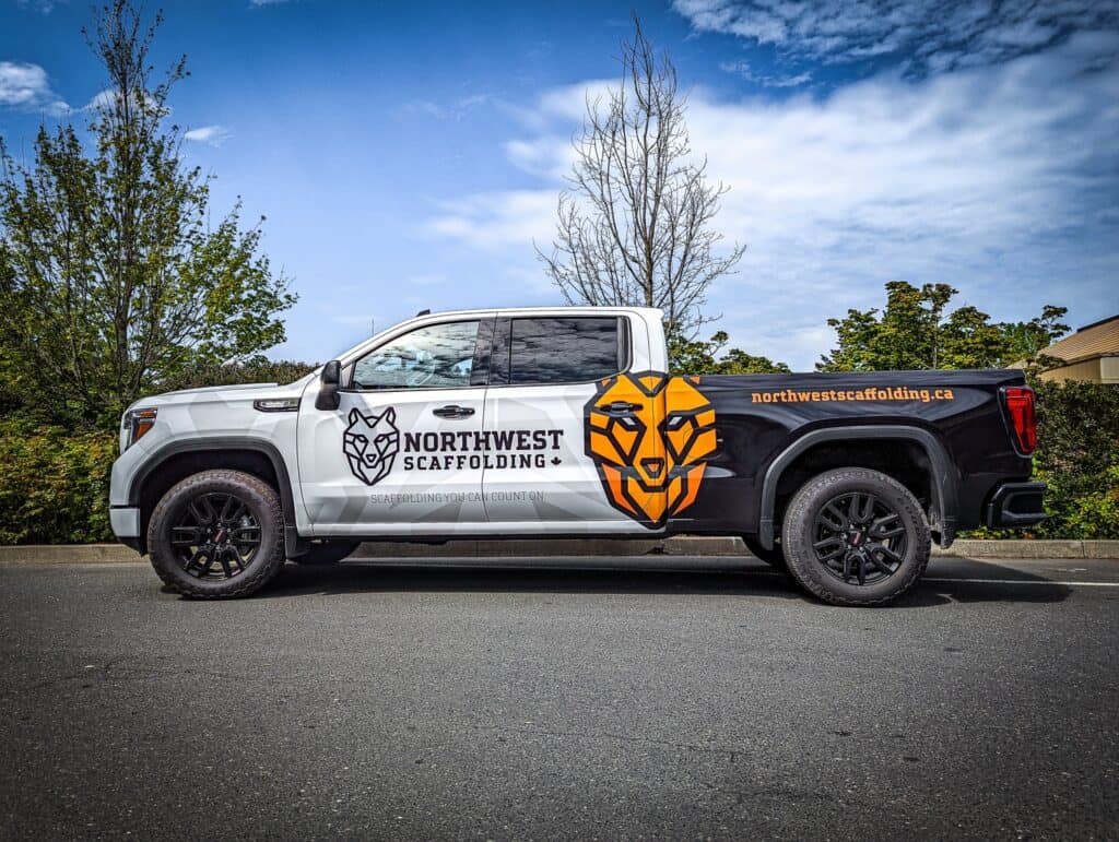 Custom vehicle wrap for Northwest Scaffolding with logo and branding.