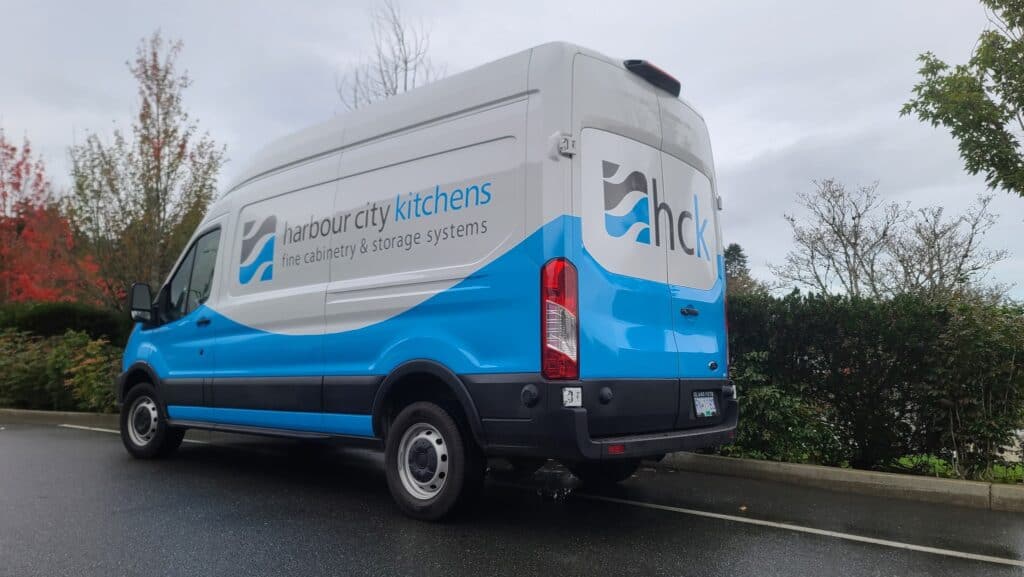 Custom vehicle wrap for Harbour City Kitchens promoting cabinetry and storage solutions.