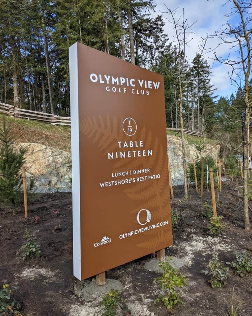 Olympic View Golf Club sign with table number and dining info.
