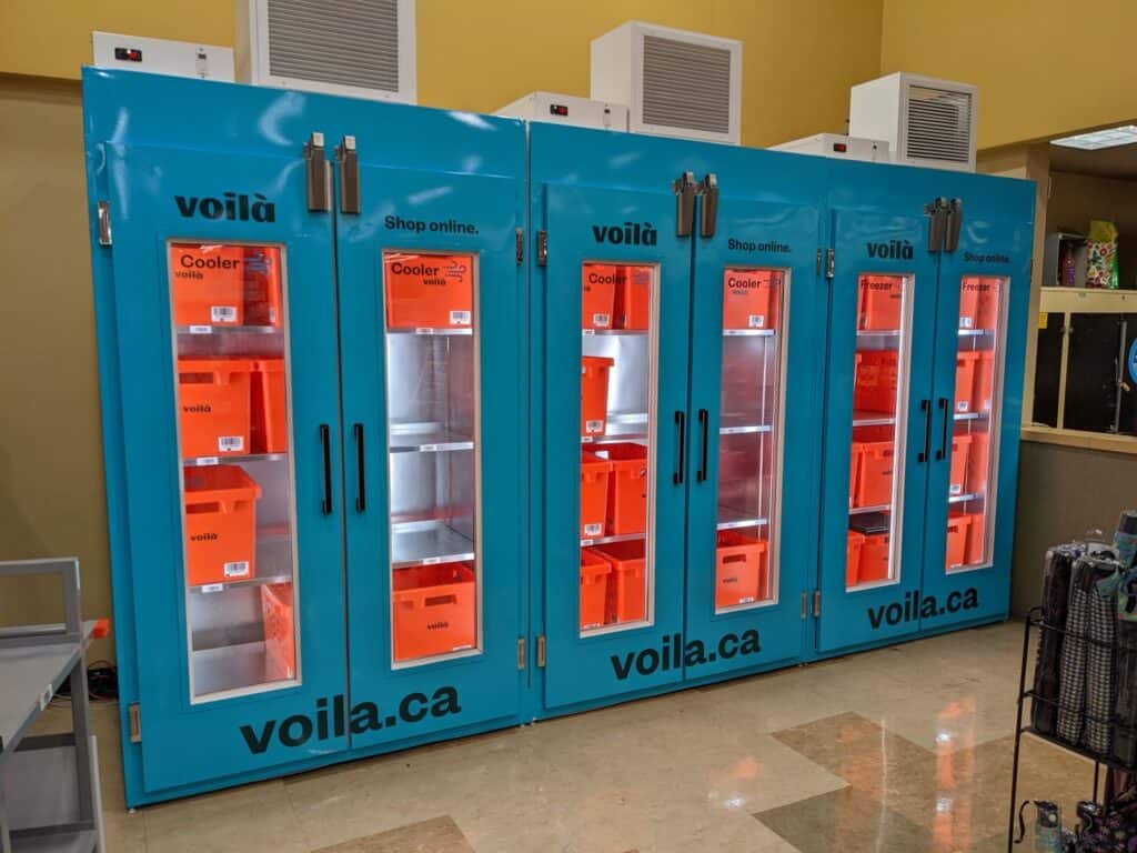 Custom signage and vehicle wraps for Voila.ca in Victoria.
