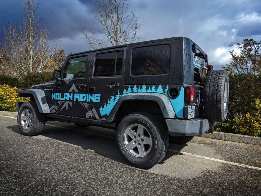 Custom vehicle wrap on Jeep with Nolan Ridinge branding in Victoria.