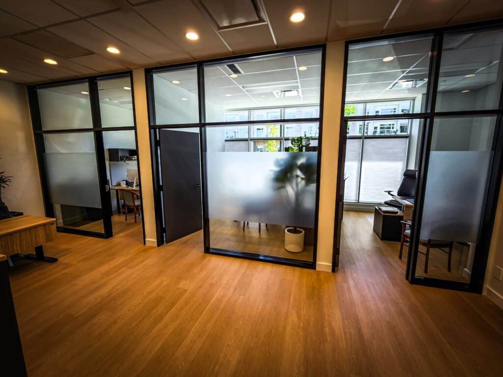 Modern office space with sign pad and custom glass partitions in Victoria.