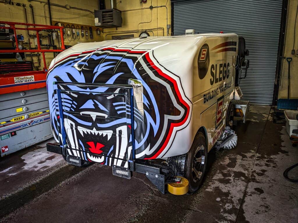 Custom vehicle wrap featuring a fierce dragon design in Victoria.