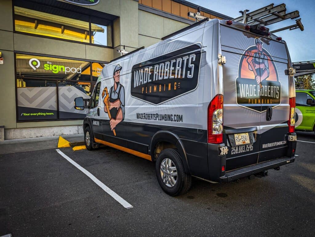 Custom plumbing van with Wade Roberts branding and logo in Victoria.