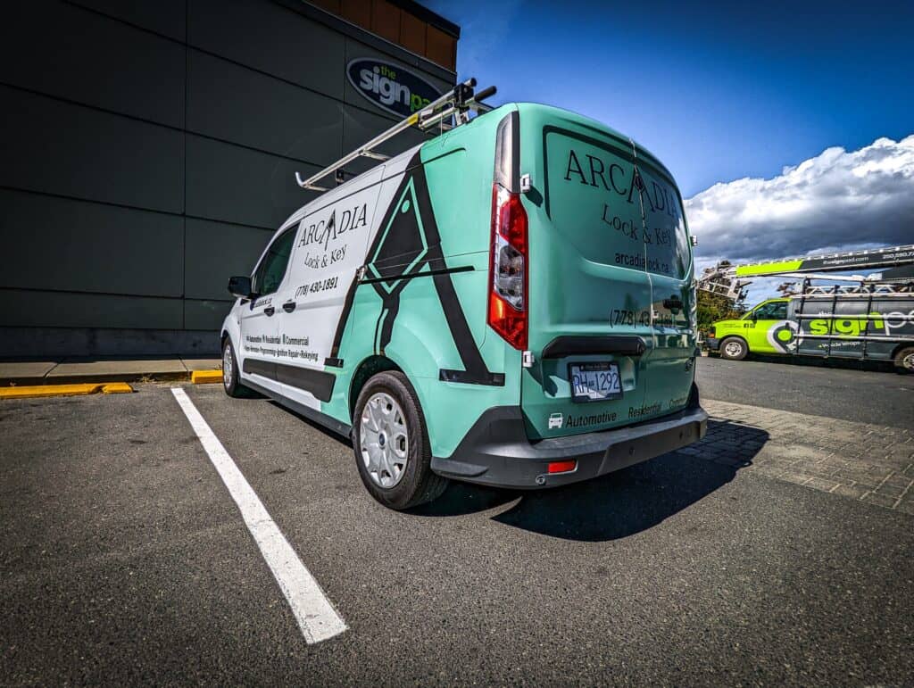Custom vehicle wrap for Arcadia Sign Pad van in Victoria, showcasing professional branding.