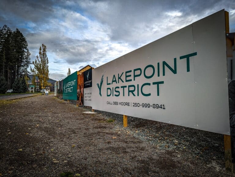 Large outdoor sign displaying "Lakepoint District" in bold letters.