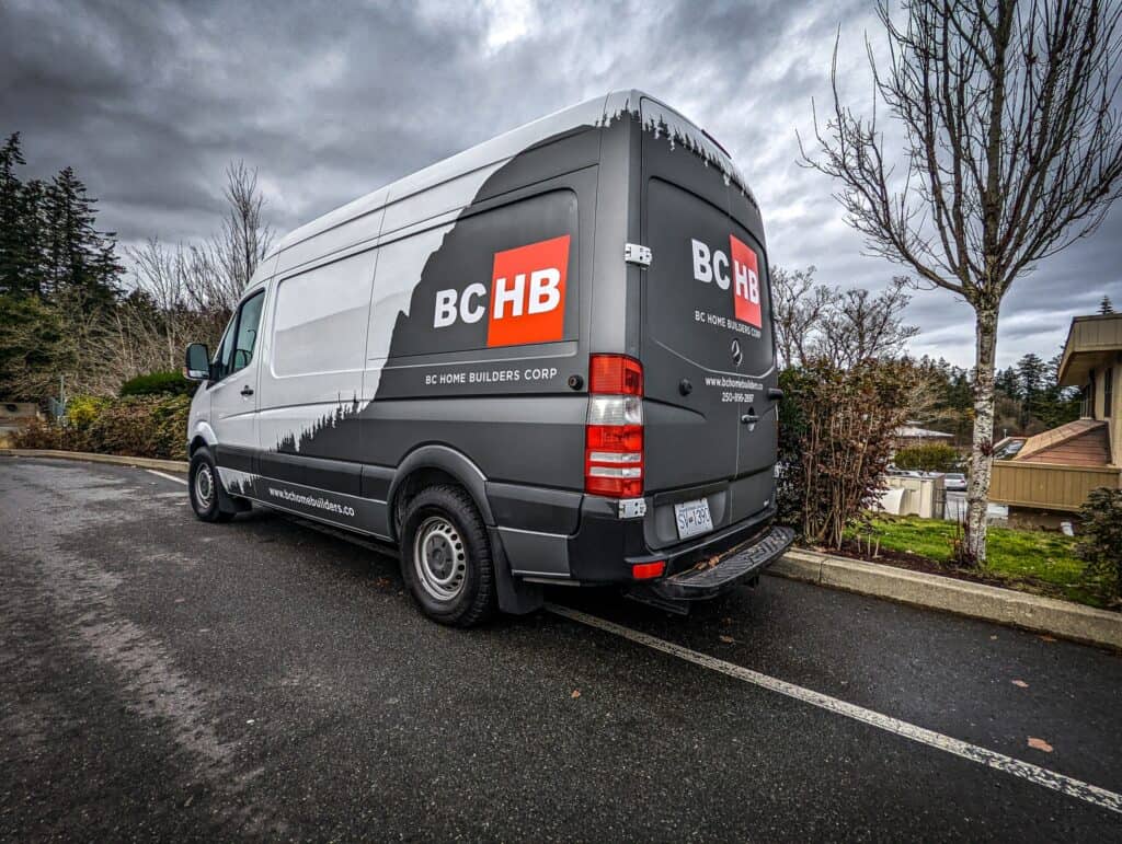 Custom BC Home Builders van wrap in Victoria showcasing professional branding.