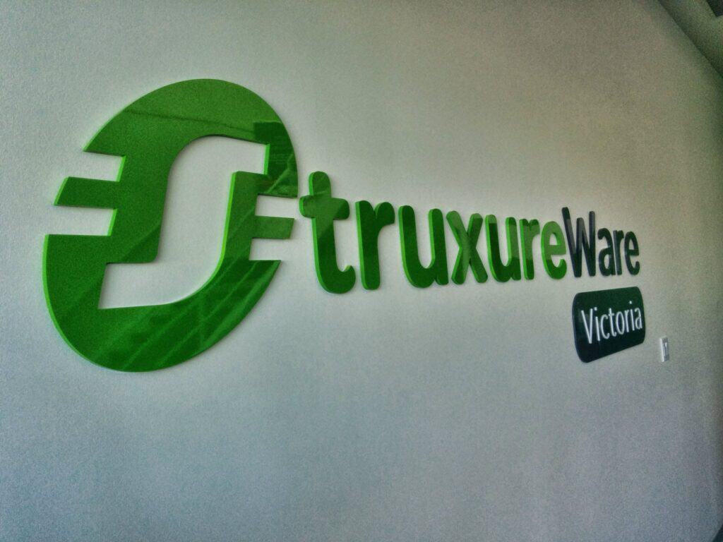 EtruxureWare logo and sign on office wall in Victoria.