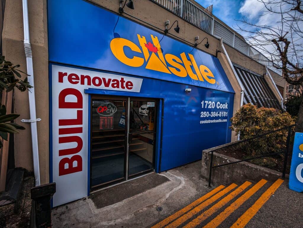 Castle retail store signage with bold logo and contact details.