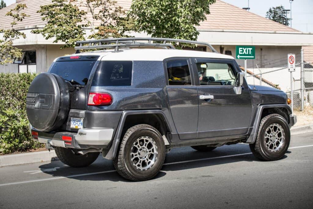 Vehicle wrap showcasing custom signage and branding.
