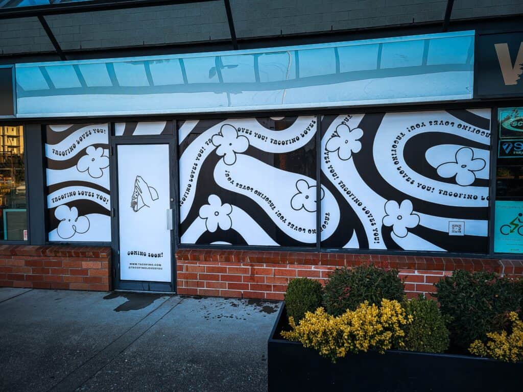 Signage featuring floral and swirl patterns for The Sign Pad, a custom signs and vehicle wraps busin.