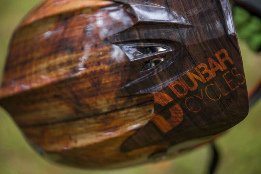 Dunbar Cycles wooden sign for custom bike branding and shop signage.