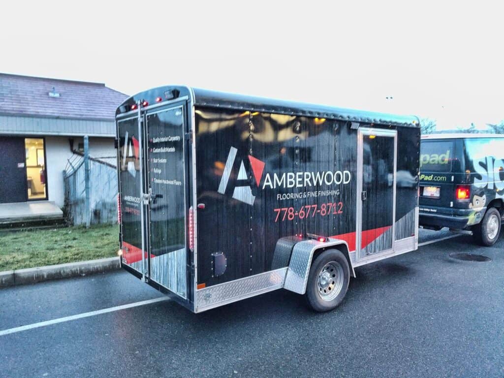Trailer with Amberwood branding and contact info.
