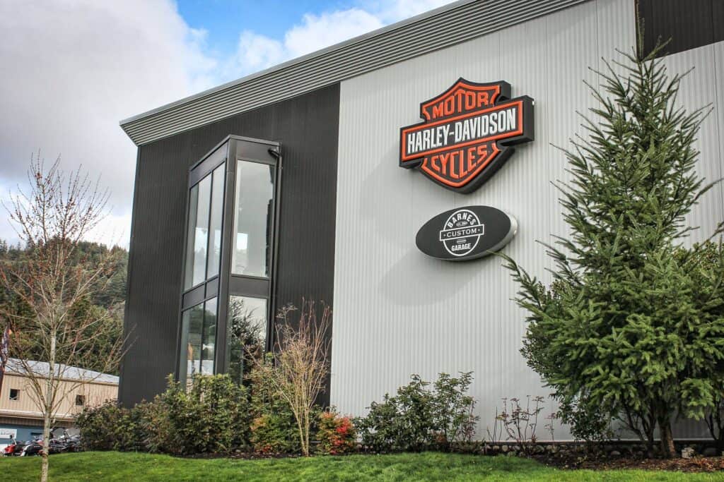 Exterior Harley-Davidson sign on a modern building in Victoria.