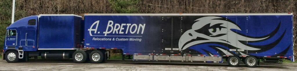 Custom vehicle wrap featuring a bold eagle design on a blue truck in Victoria.