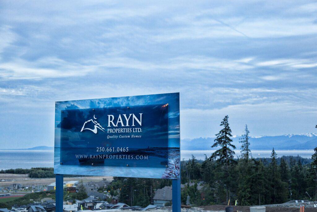Custom outdoor billboard for Rayn Properties Ltd. in Victoria.