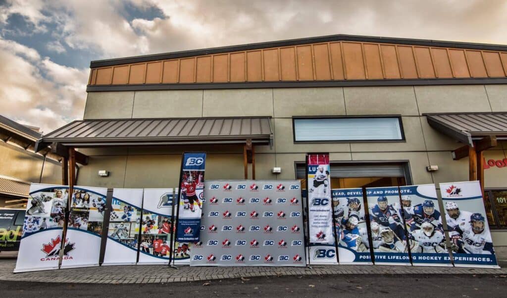 Custom outdoor sign display for hockey event in Victoria.