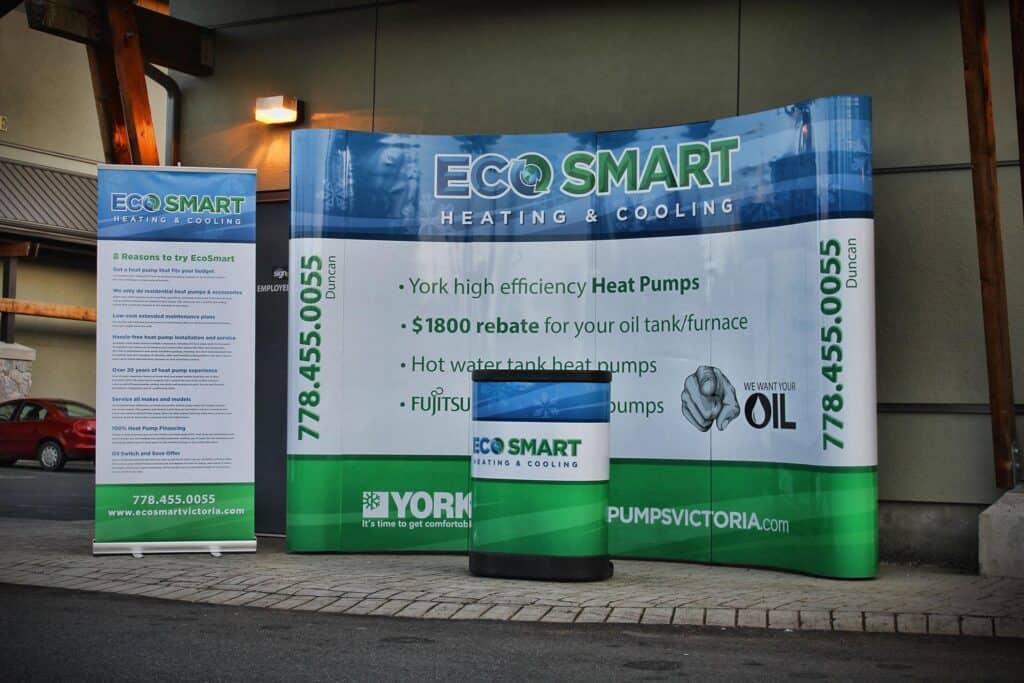 Eco Smart heating and cooling display with York heat pumps and contact info.