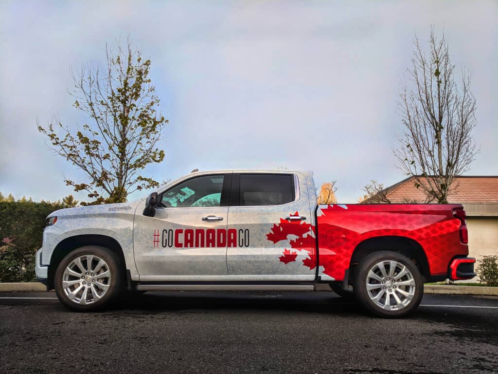 Custom vehicle wrap with Canadian flag design in Victoria, BC.